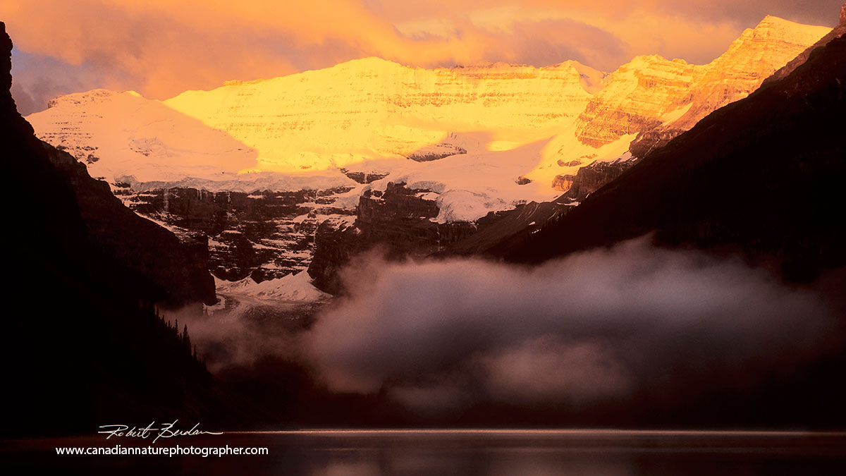 Lake louise in summer about 5 am - first light is hitting the glacier by Robert Berdan ©