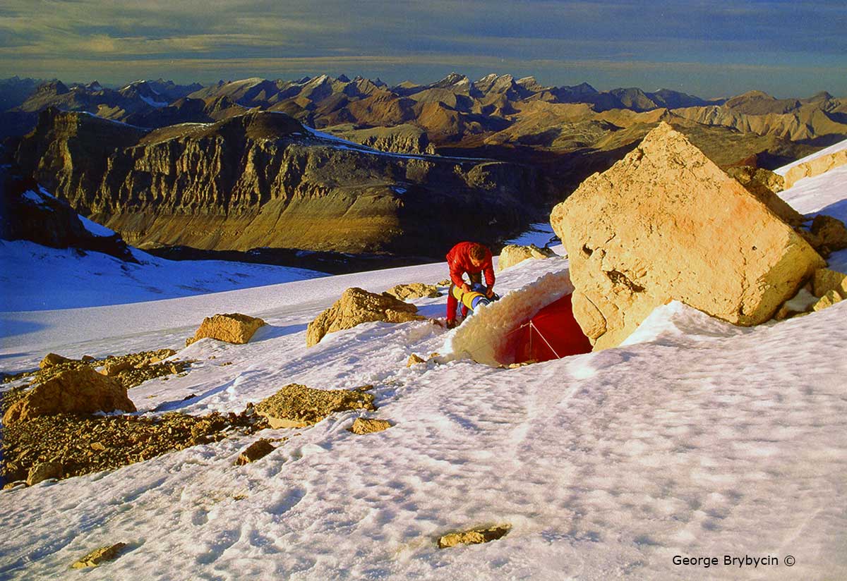 George Bybycin camping just below the summit of Mt. Hector (3394 m).