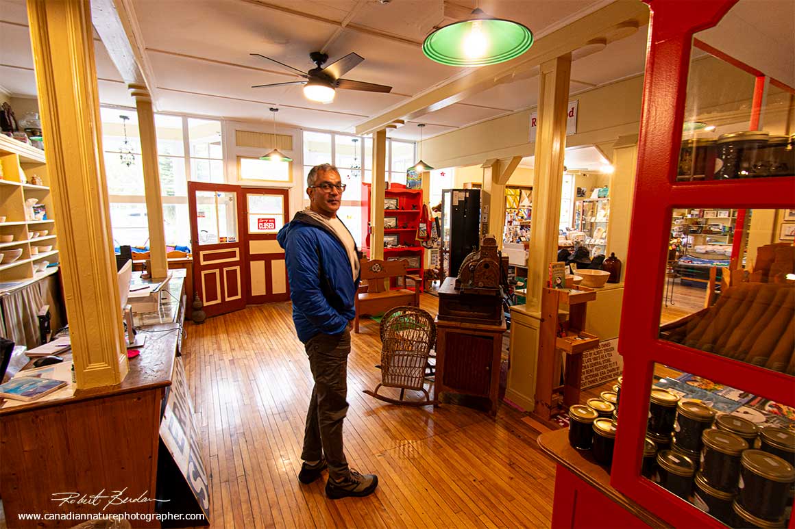 Kamal Varma (our navigator) exploring a gift shop in Trinity Newfoundland by Robert Berdan ©
