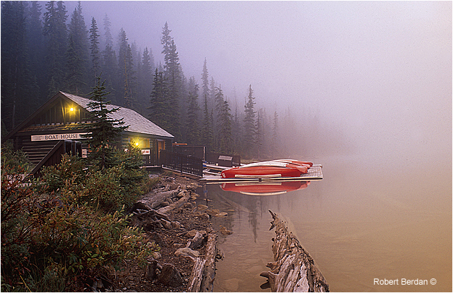 Boat house at lake louise in fog before sunrise by Robert Berdan ©