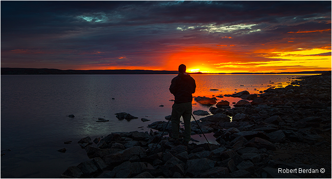Nigel Fearon silhoutte in front of sunrise at Point Lake by Robert Berdan ©