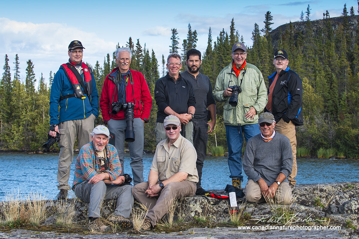 Guests and fishing guides pose for a group shot after the fish fry Yellowknife Robert Berdan ©