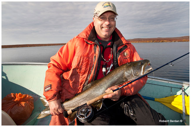 Frank Wood proudly holds a laketrout by Robert Berdan ©
