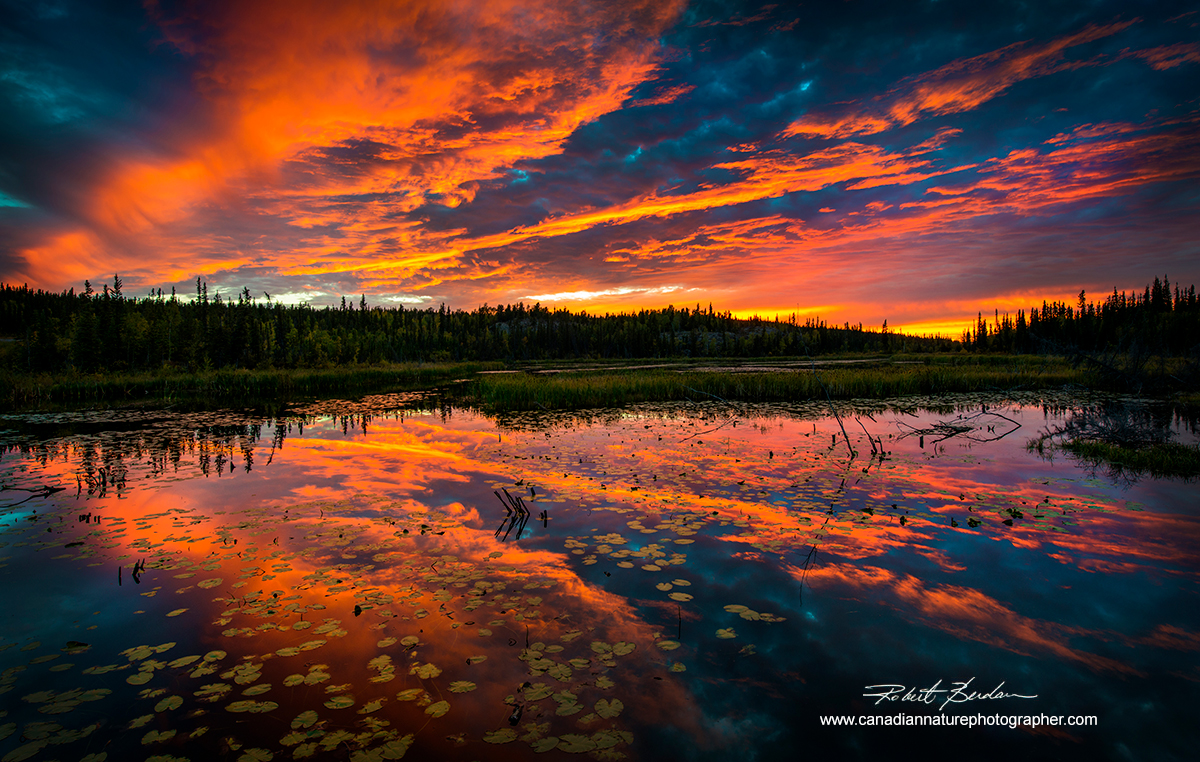 Sunset over pond next to the Ingraham Trail outside of Yellowknife, Northwest Territories by Robert Berdan ©