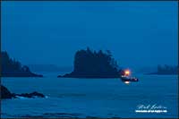 Fishing boat returning Uclulet harbour early morning, Vancouver Island by Robert Berdan 