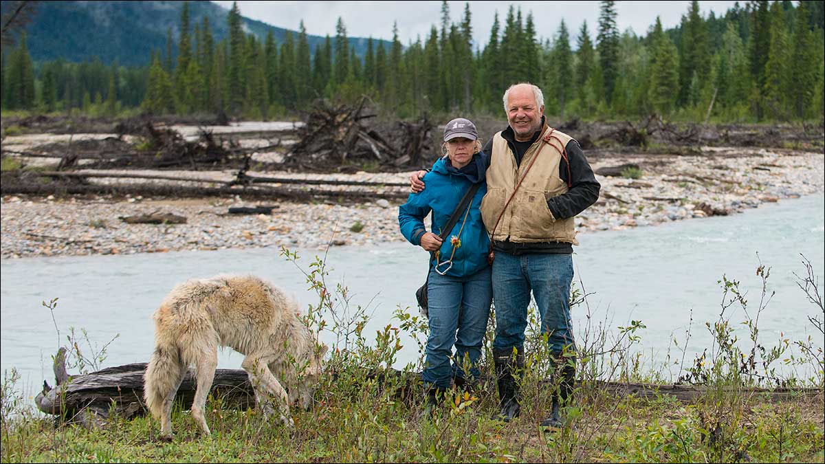 Shelly and Casey Black in Blaeberry Valley with one of their wolves by Robert Berdan ©